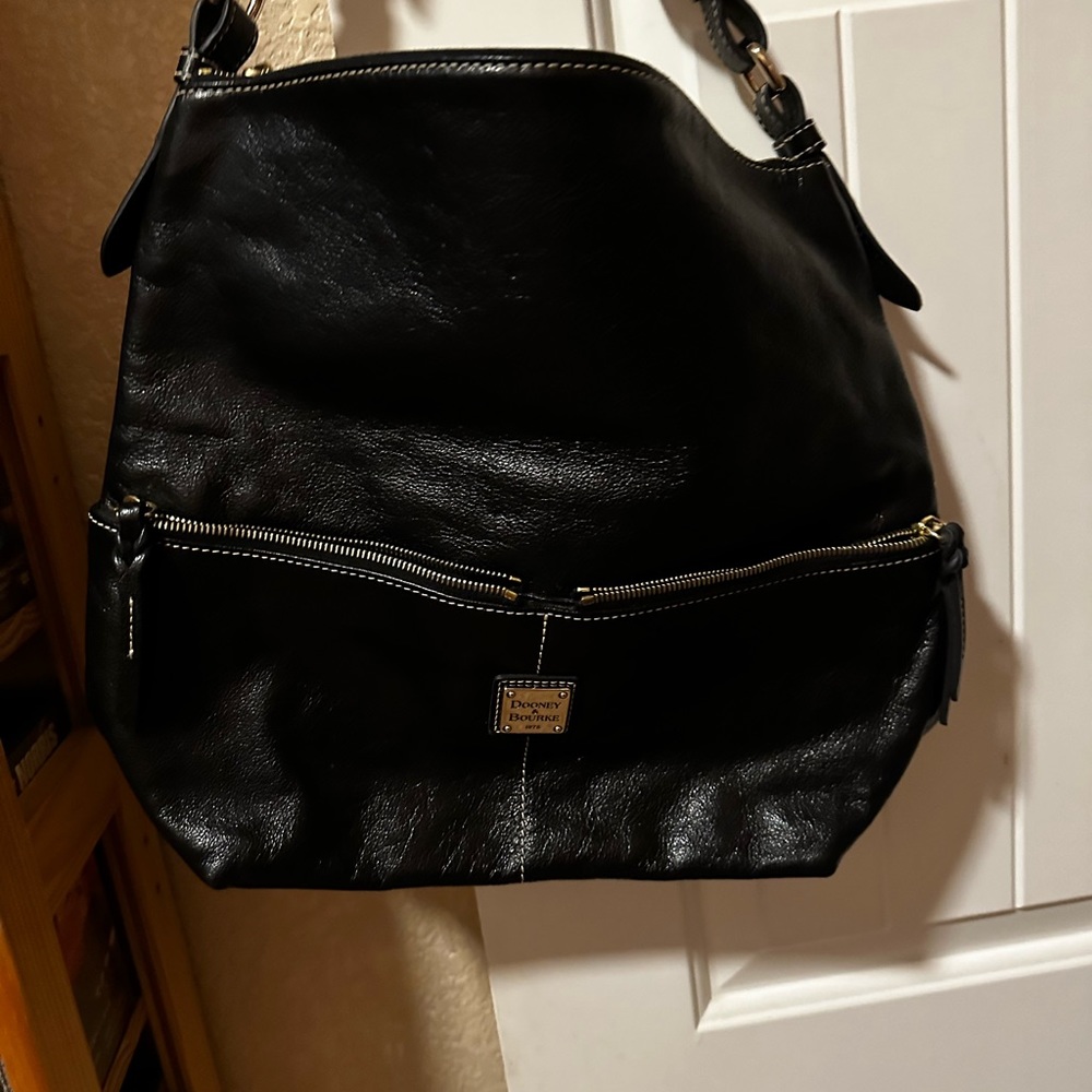 Dooney Bourke black leather bag .